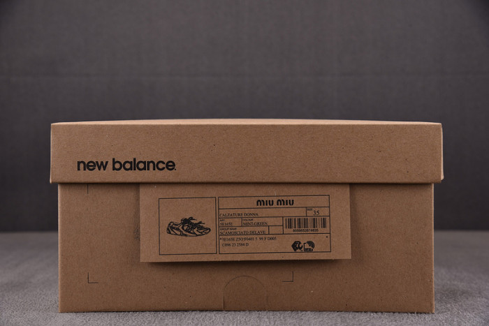 M*u M*u x New Balance Leather Sneakers UM002